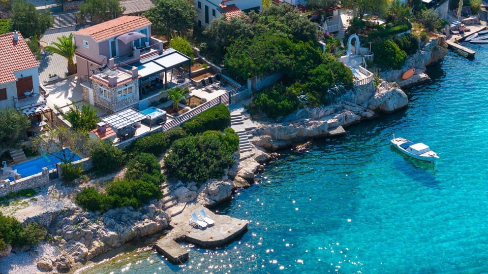 Property building, Nearby landmark, Day, Natural landscape, Bird's eye view, Beach, Sea view
