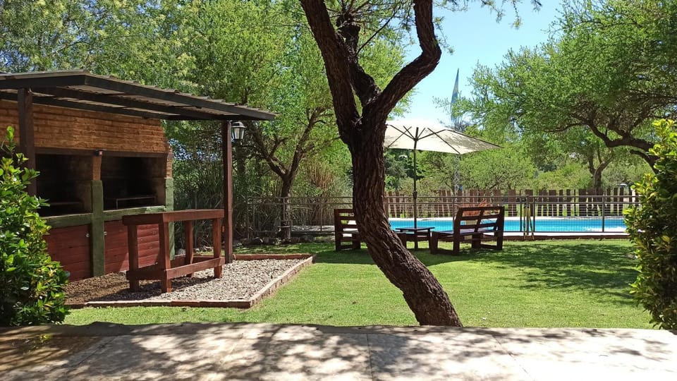Property building, Patio, Spring, Day, Natural landscape, Garden, Garden view, Pool view, Swimming pool, sunbed