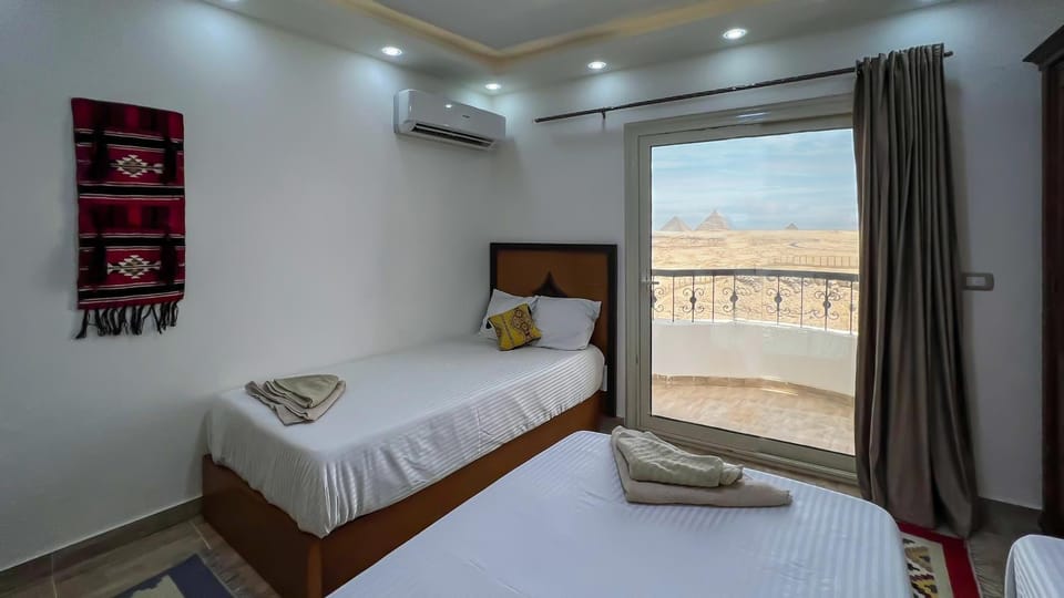 Bed, Natural landscape, View (from property/room), Balcony/Terrace, air conditioner