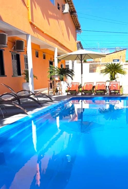 Swimming pool, sunbed