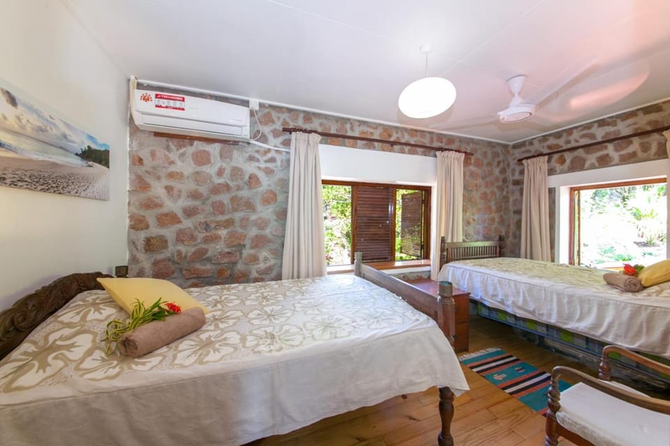 Property building, Bed, Bedroom, Garden view, air conditioner