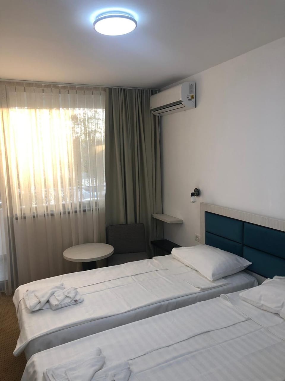 Bed, Bedroom, towels, air conditioner