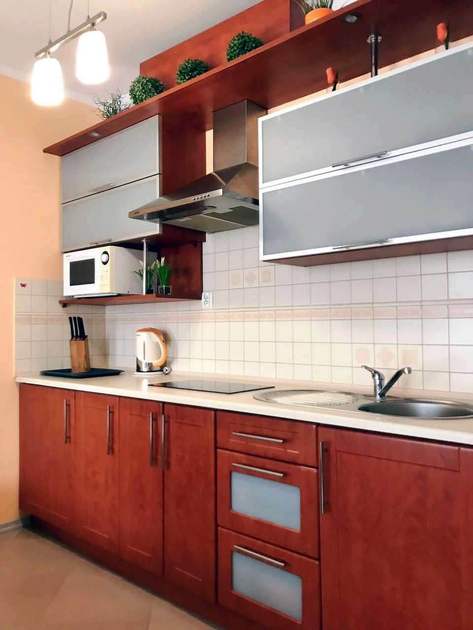 Kitchen or kitchenette, stove