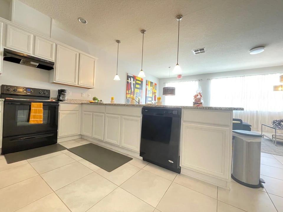 Kitchen or kitchenette, dishwasher, oven, stove, toaster