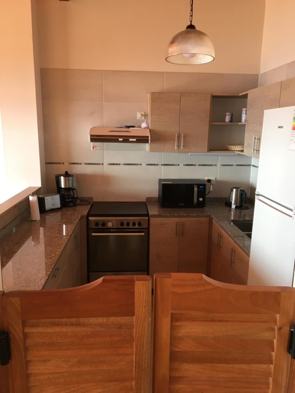 Kitchen or kitchenette, oven, stove, toaster