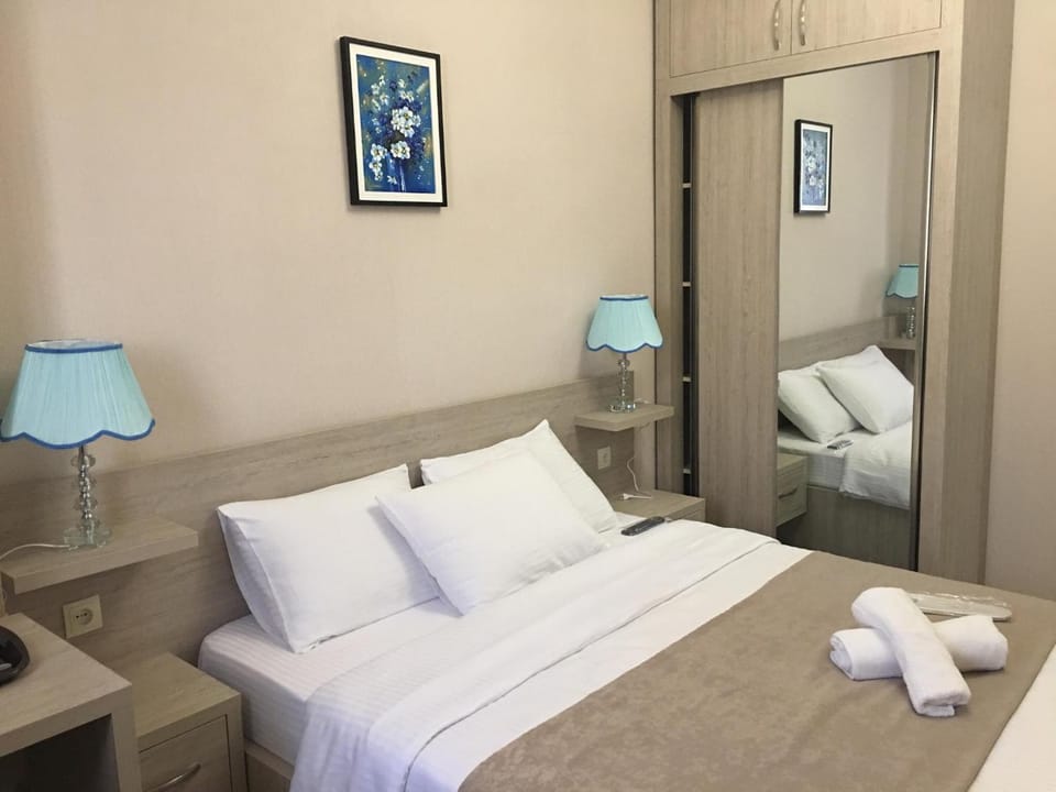 Bed, Bedroom, towels, wardrobe, air conditioner