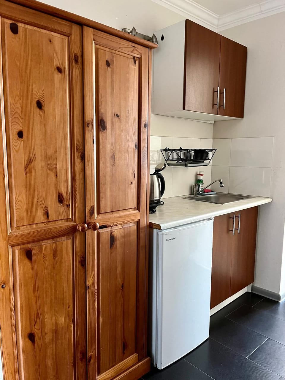 Kitchen or kitchenette, stove, wardrobe