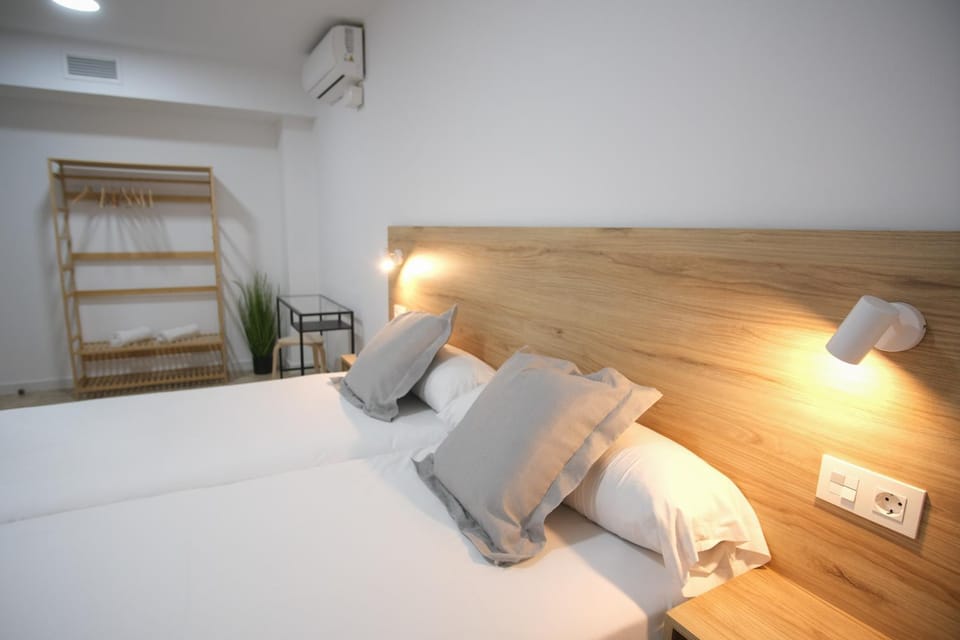 Bed, Photo of the whole room, Bedroom, towels, air conditioner