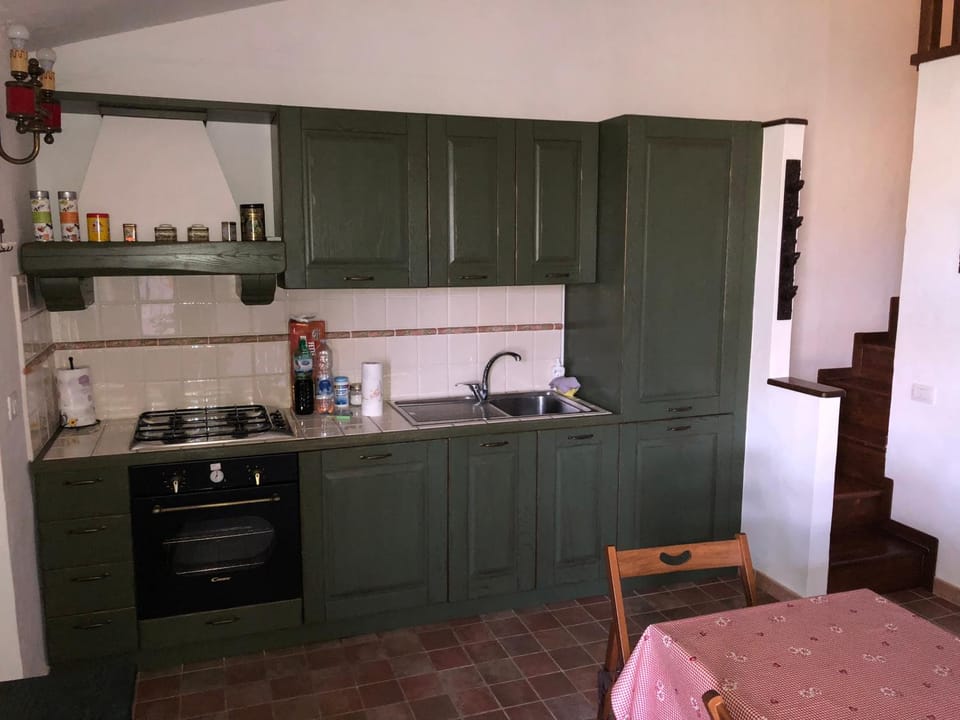 Kitchen or kitchenette, stove