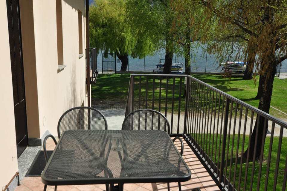 Patio, Garden, Seating area, Garden view, Lake view