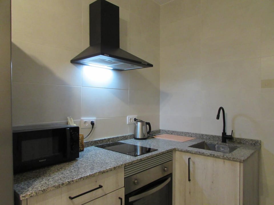 Kitchen or kitchenette, stove