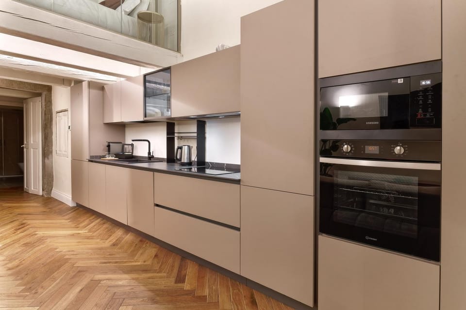 Kitchen or kitchenette, dishwasher, oven, stove, washing machine, dryer