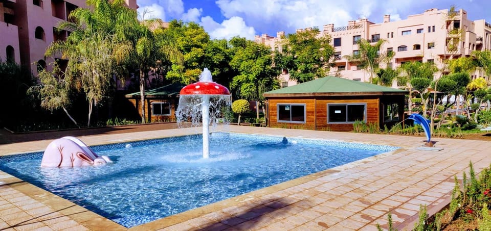 Appart Piscine Jardin somptueux à 2 min de palmeraie et 10 min de Majorelle Apartment in Marrakesh