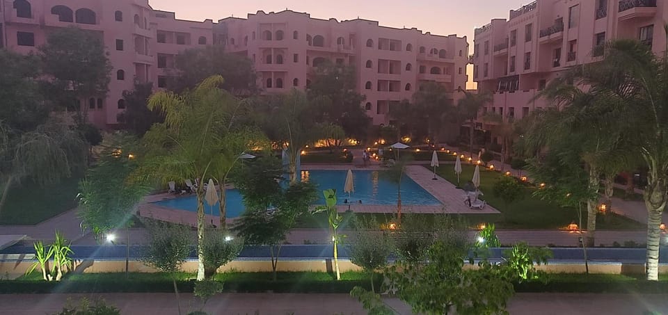 Appart Piscine Jardin somptueux à 2 min de palmeraie et 10 min de Majorelle Apartment in Marrakesh