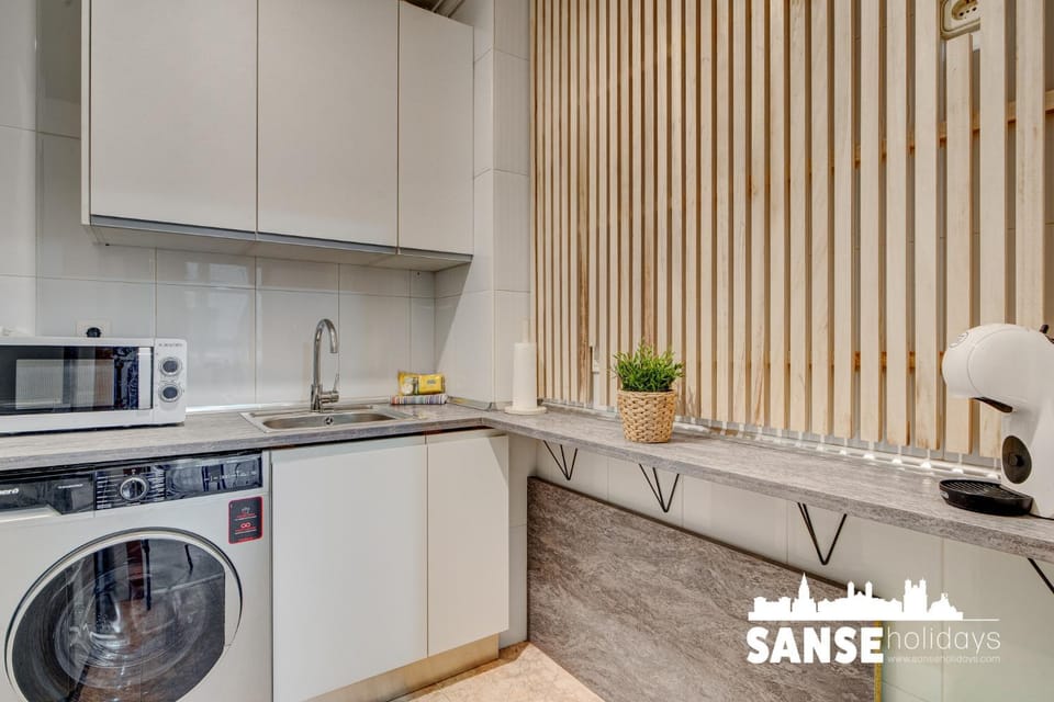 Kitchen or kitchenette, washing machine