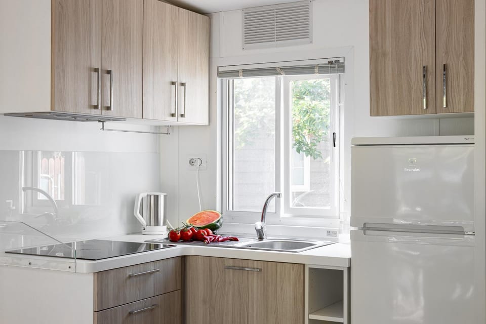 Kitchen or kitchenette, oven, stove