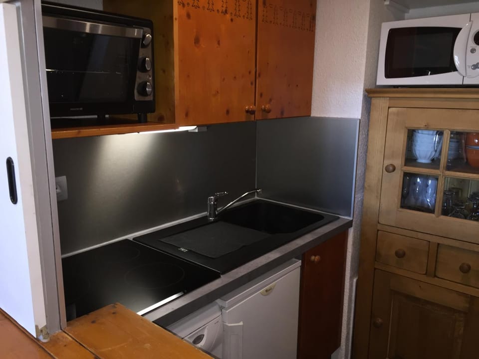 Kitchen or kitchenette, microwave