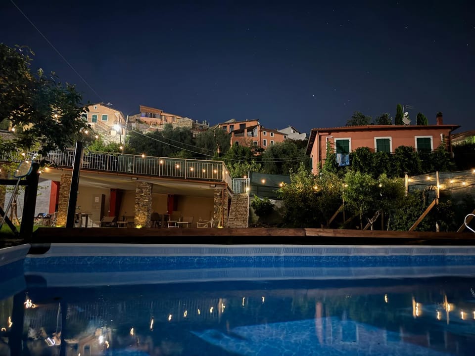 Property building, Night, Pool view, Swimming pool