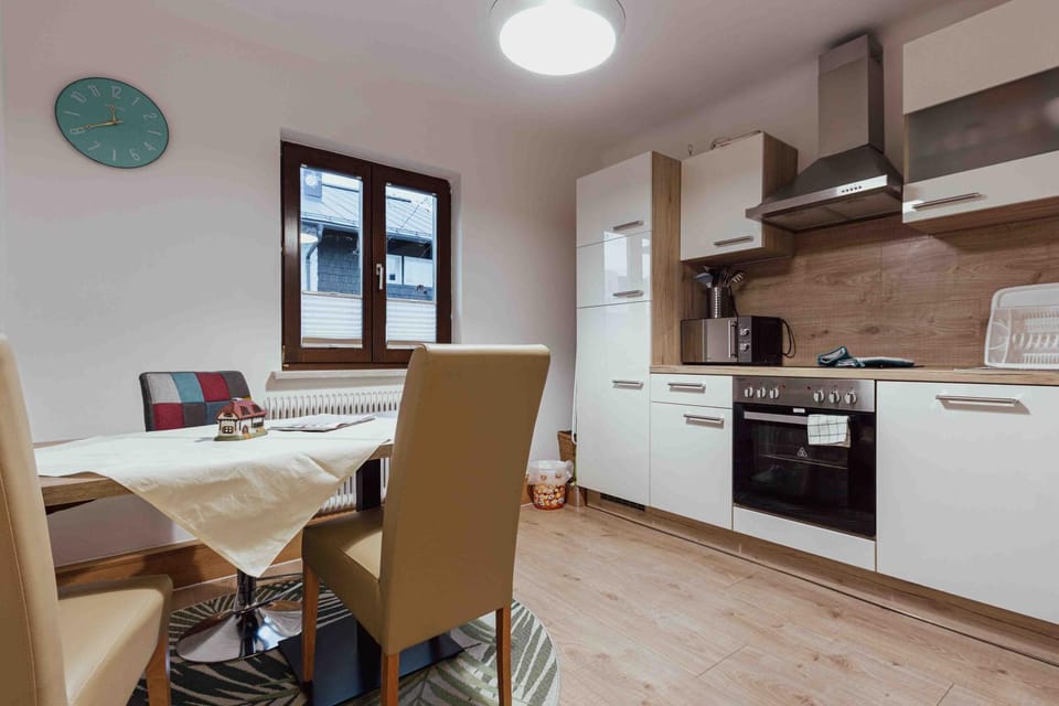 Kitchen or kitchenette, Seating area, Dining area, dishwasher, oven, stove