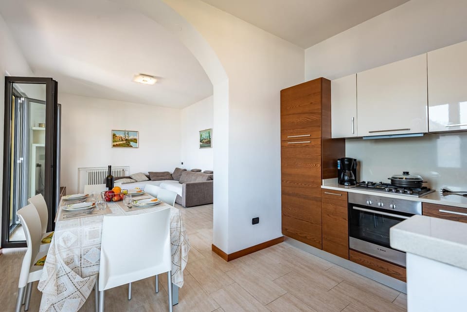 Kitchen or kitchenette, Living room, Seating area, Dining area, dishwasher, oven, stove, toaster