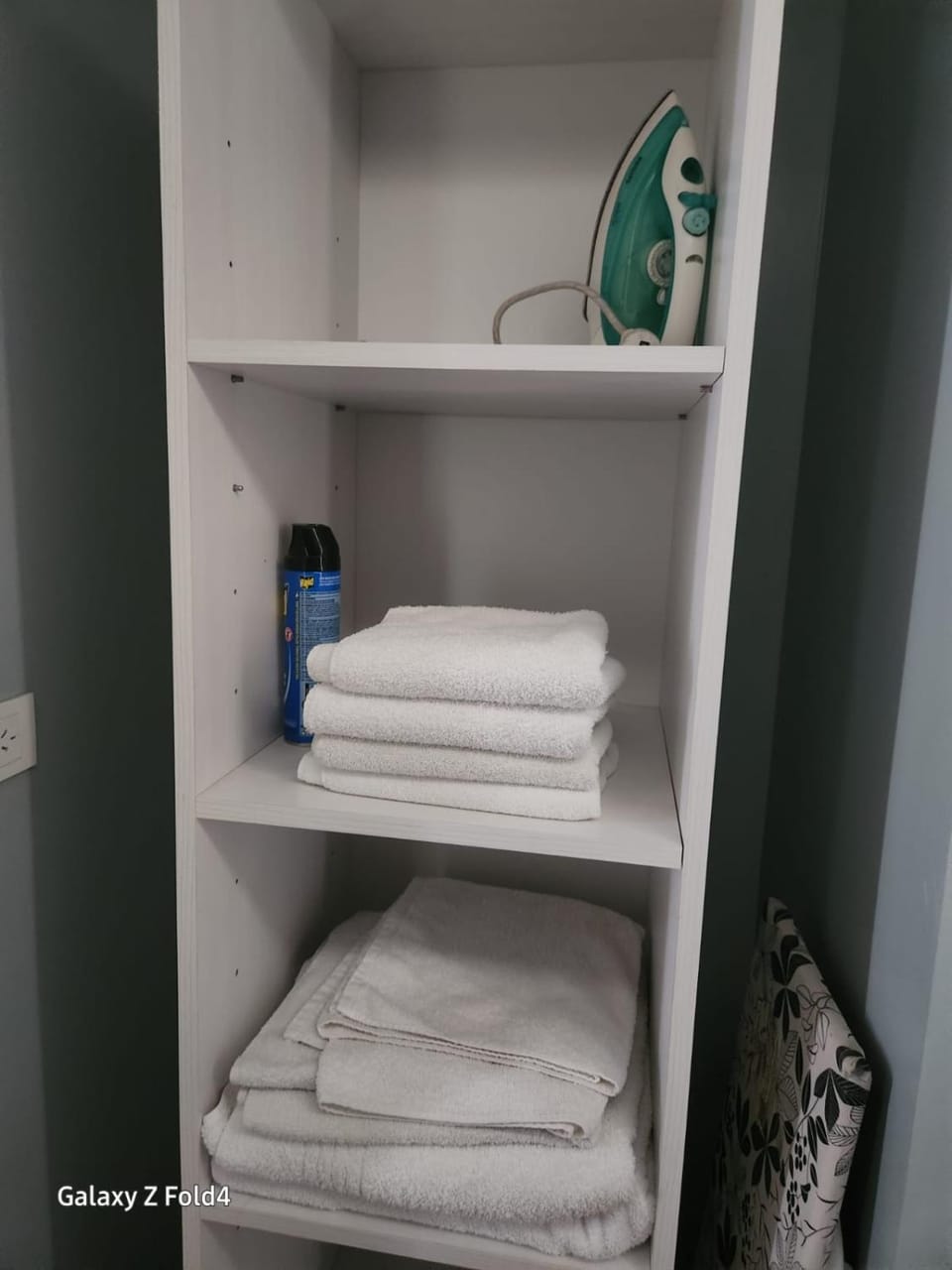 flat iron, furniture, towels
