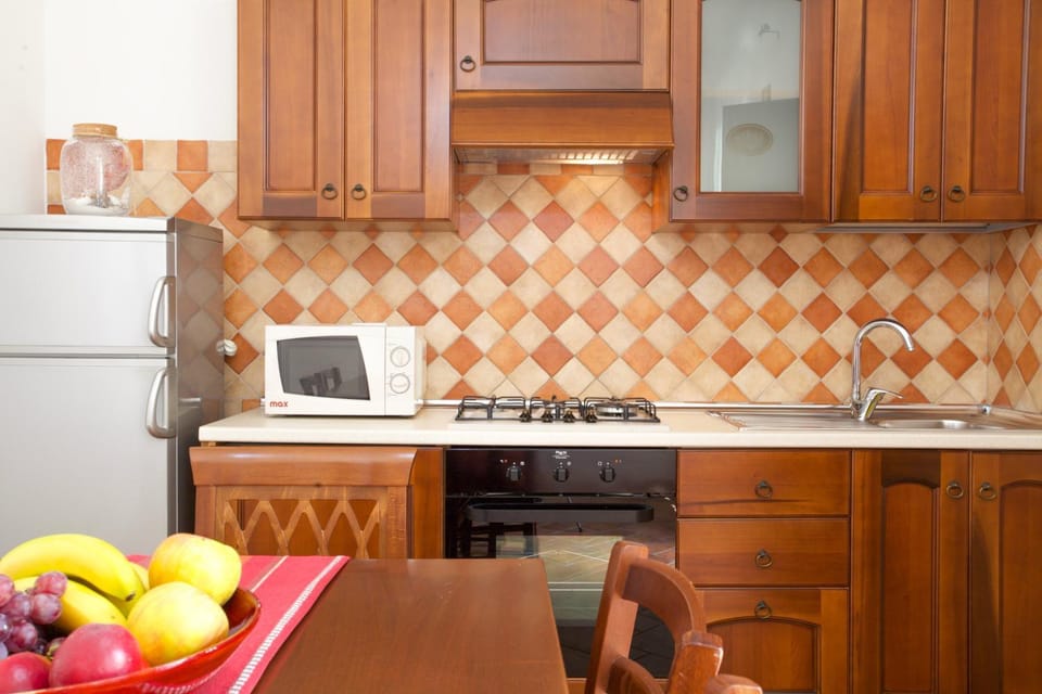 Kitchen or kitchenette, oven, stove