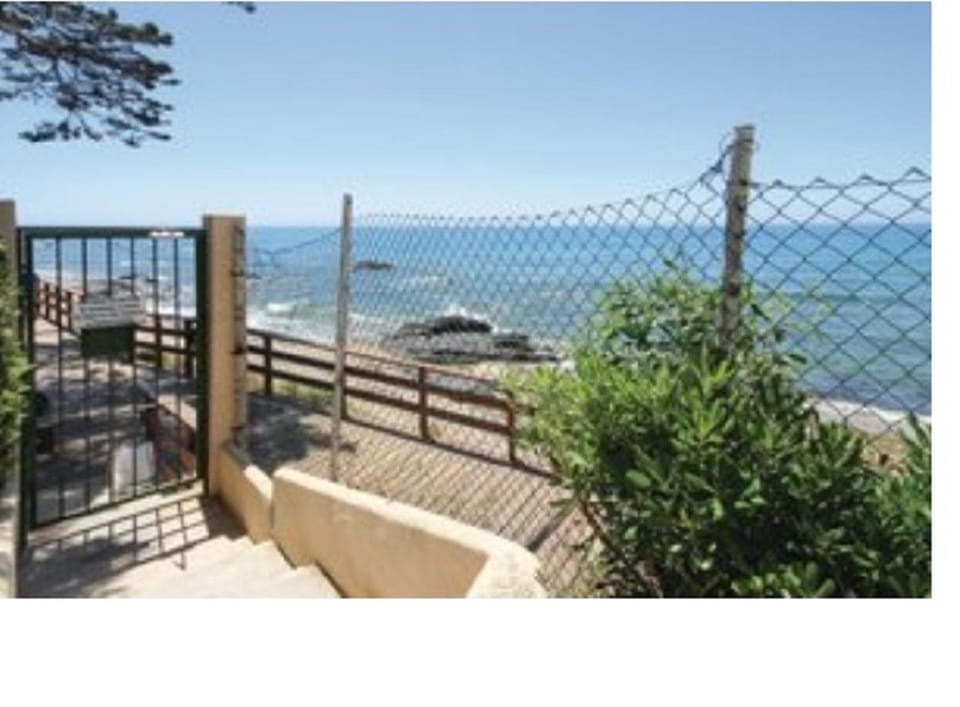 Property building, Nearby landmark, Day, Natural landscape, View (from property/room), Beach, Sea view