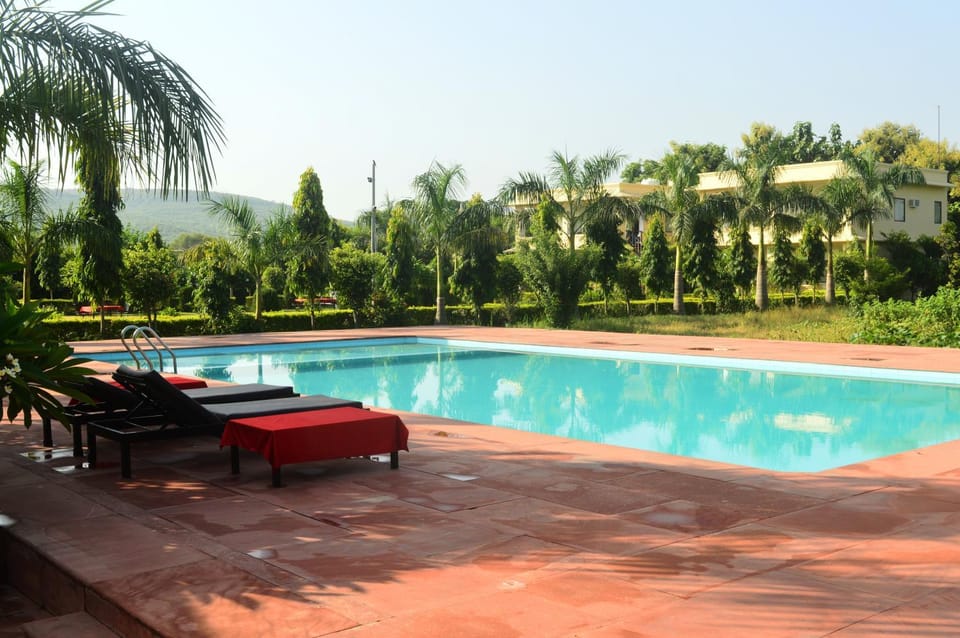 View (from property/room), Garden view, Landmark view, Landmark view, Mountain view, Pool view, Swimming pool