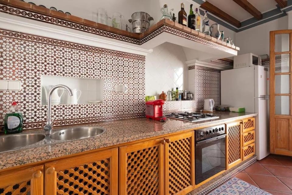 Kitchen or kitchenette, stove, kitchen