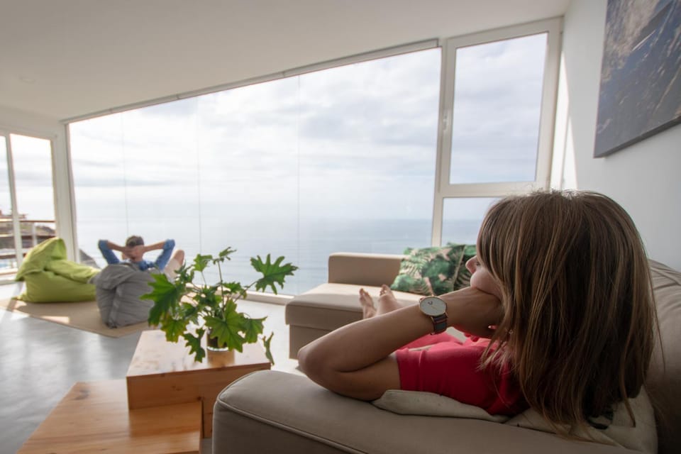 Property building, People, Living room, Sea view