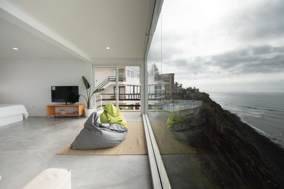 Property building, Living room, Pool view, Sea view