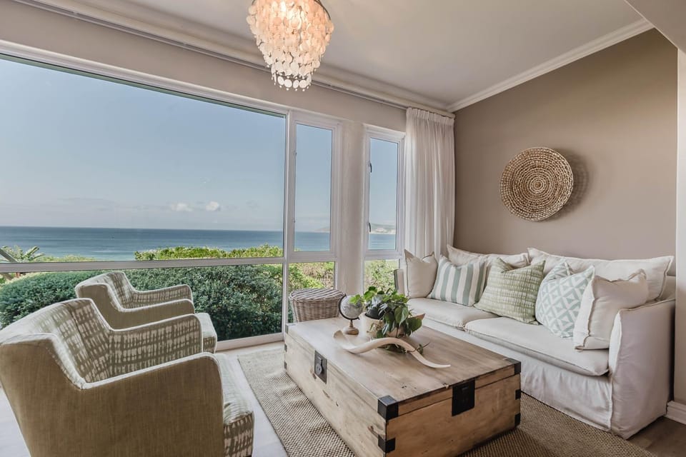 View (from property/room), Living room, Decorative detail, Seating area, Sea view