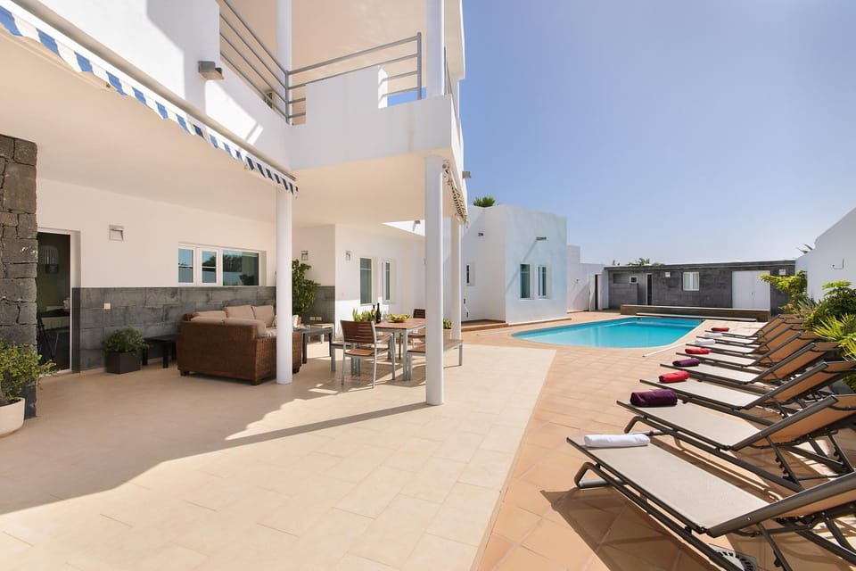 Property building, Living room, Swimming pool