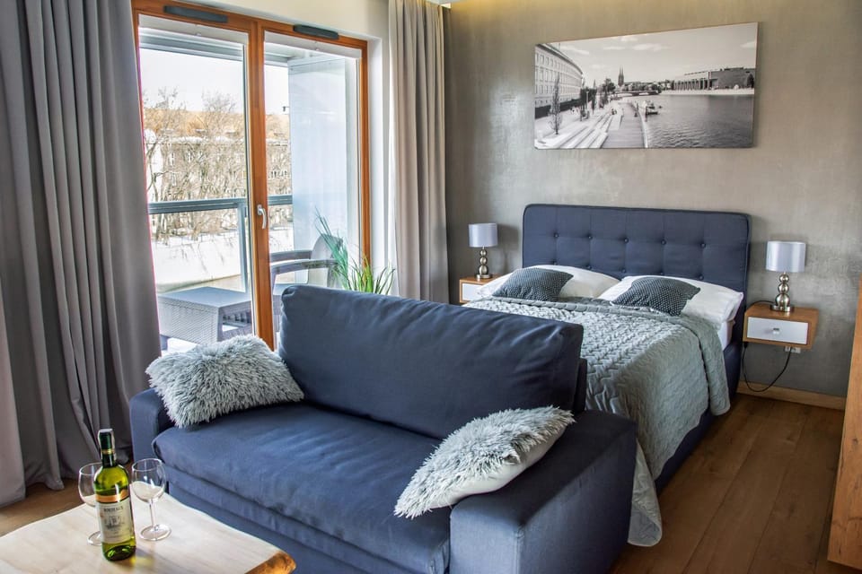 Bed, Living room, Seating area, Bedroom