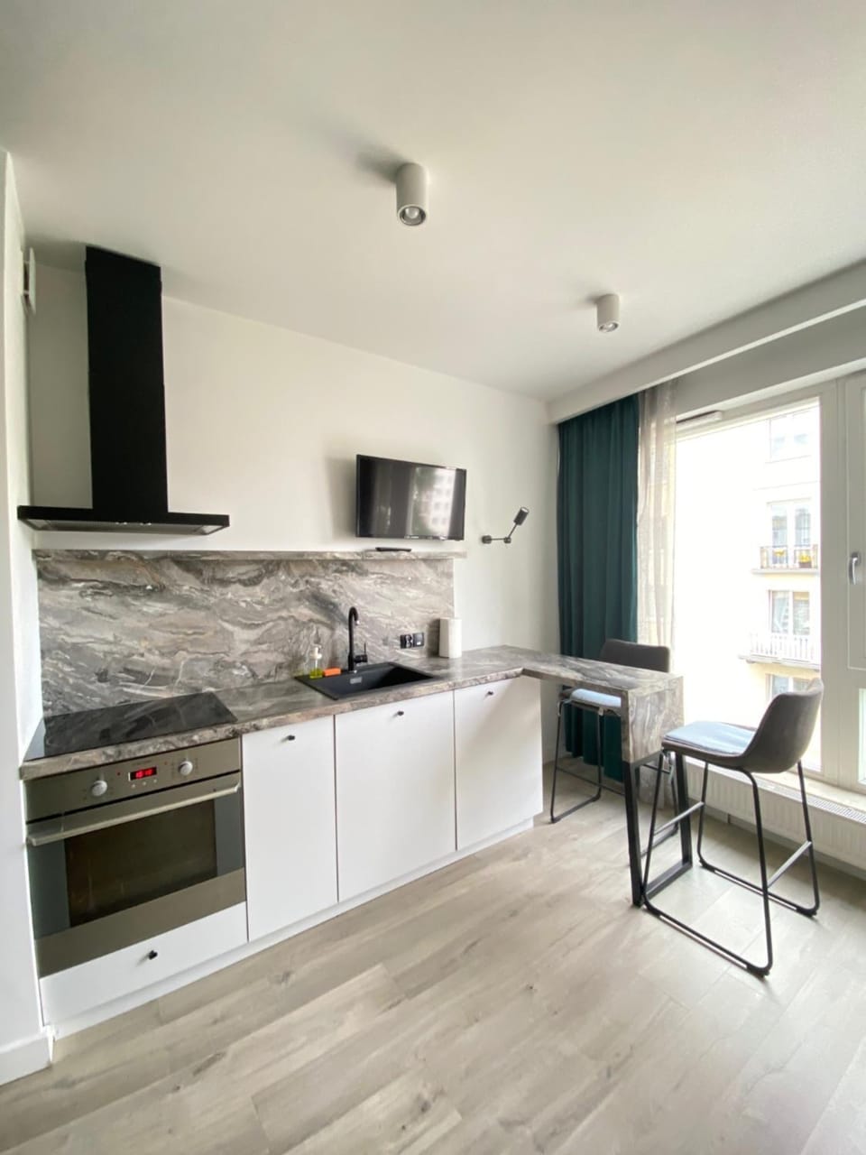 Kitchen or kitchenette, oven, stove