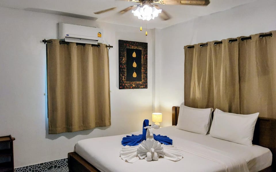 Bed, Photo of the whole room, Bedroom, towels, air conditioner