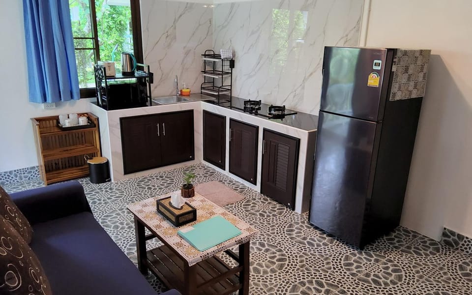 Kitchen or kitchenette, Living room, microwave, stove, toaster