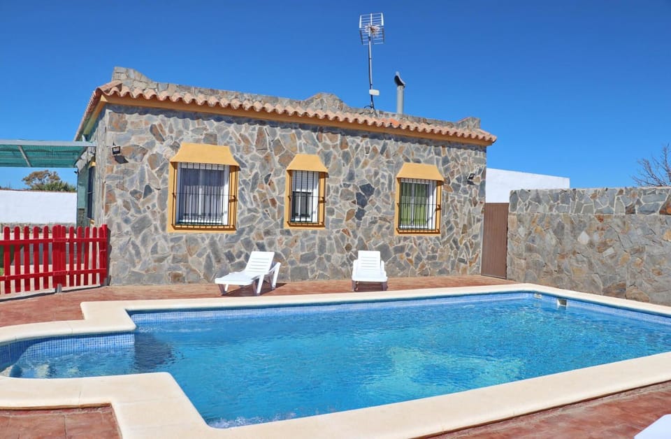 Swimming pool, sunbed