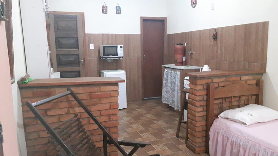 Suíte com cozinha em Ibitipoca House in State of Rio de Janeiro