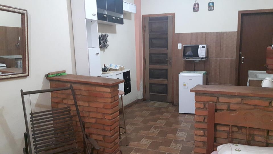Suíte com cozinha em Ibitipoca House in State of Rio de Janeiro