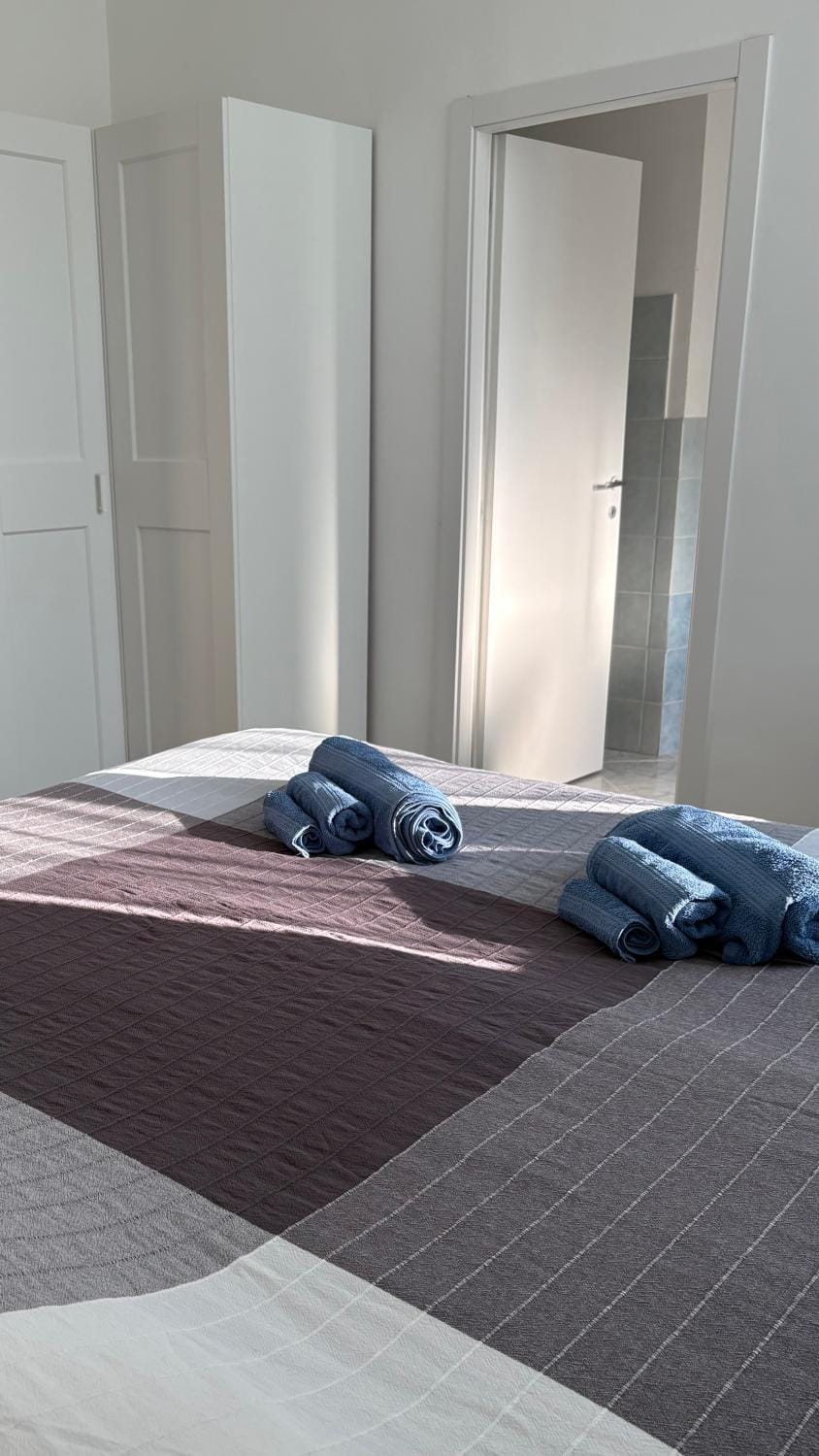 Bed, Photo of the whole room, Bedroom, towels, wardrobe