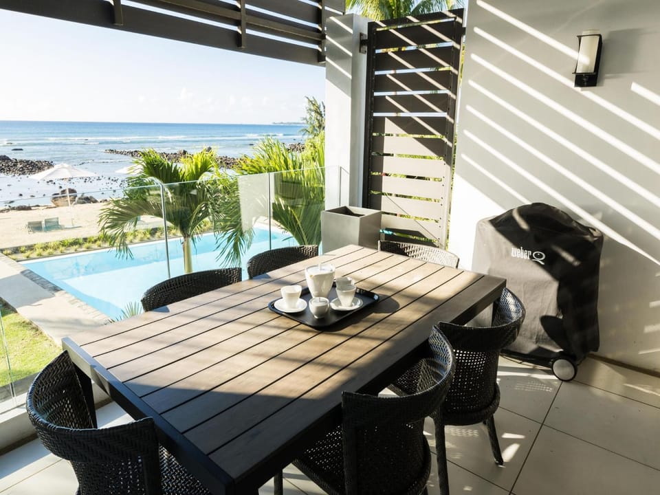 Beachfront & Pool serviced apartment with stunning view - closest to the beach than most hotel Apartment in Pointe aux Biches