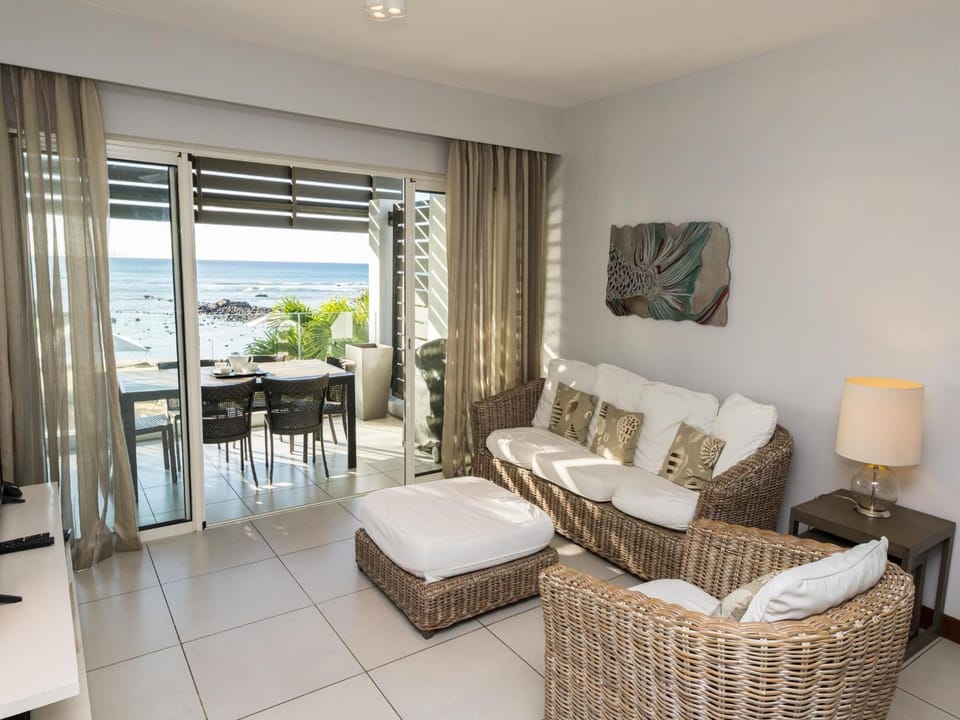 Beachfront & Pool serviced apartment with stunning view - closest to the beach than most hotel Apartment in Pointe aux Biches