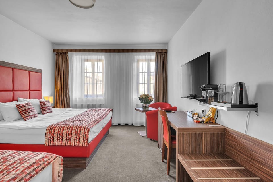 Bed, TV and multimedia, Seating area, Bedroom, hair dresser