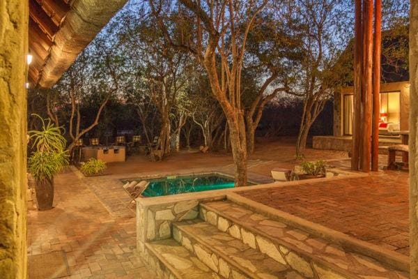 Property building, Patio, Garden, View (from property/room), Swimming pool