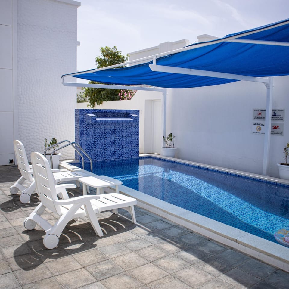 Seating area, Swimming pool, Swimming pool, sunbed