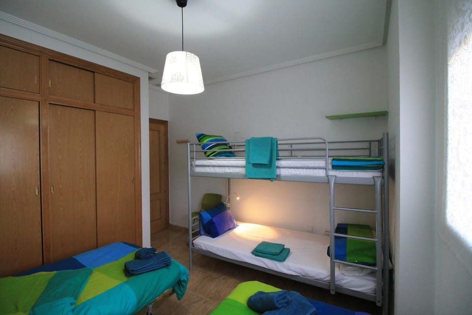 Bed, Photo of the whole room, Street view, group of guests, bunk bed, Quiet street view