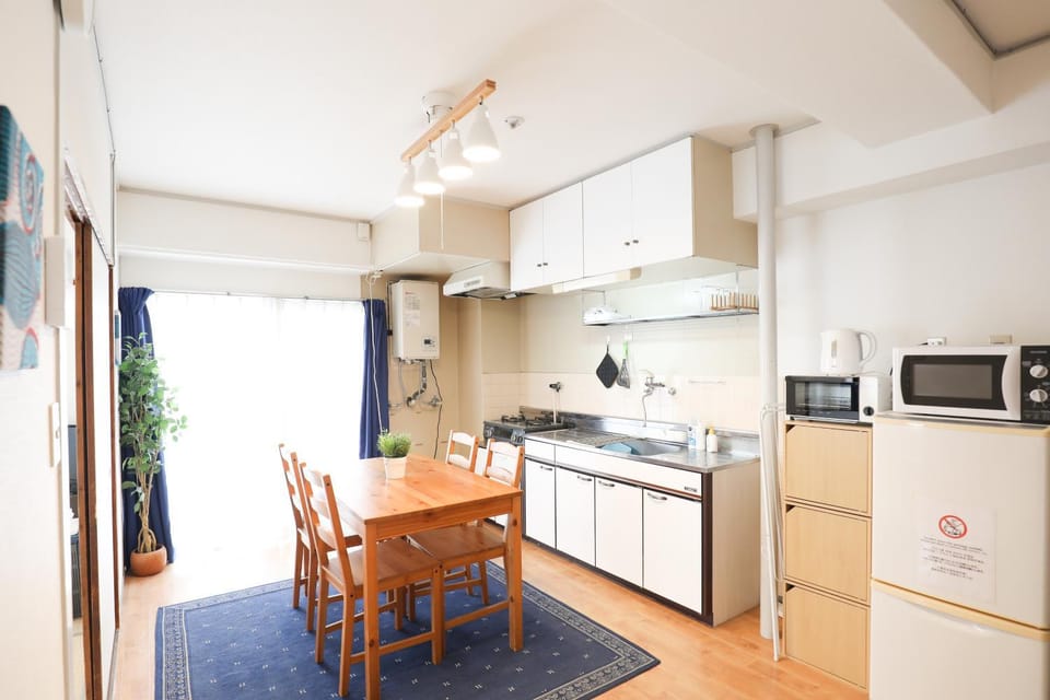 Kitchen or kitchenette, Dining area, dishwasher, minibar, stove