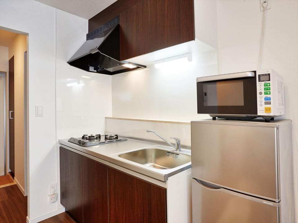 Kitchen or kitchenette, minibar, kitchen