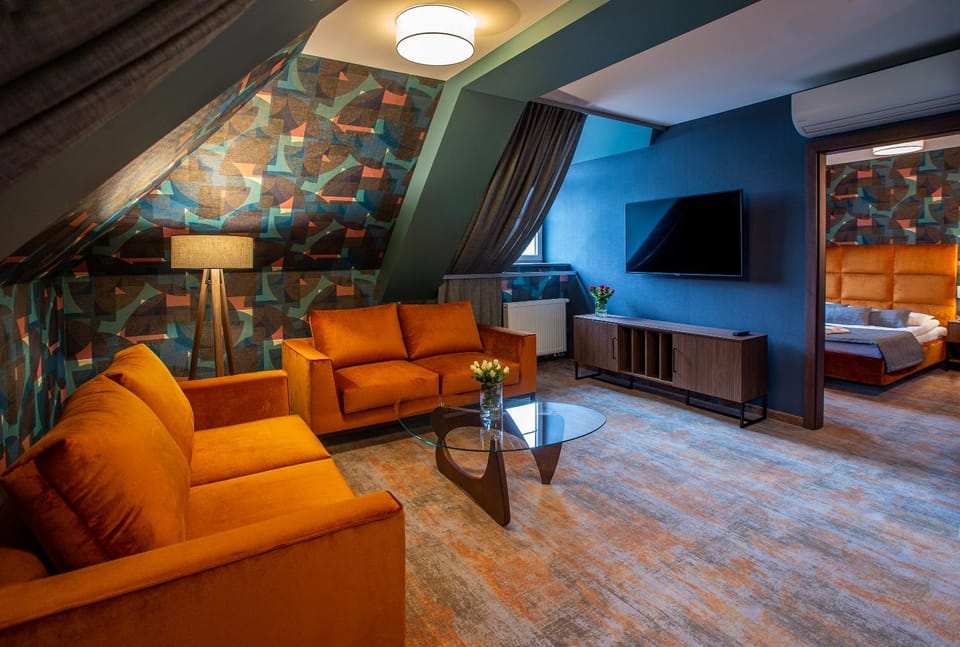 Bed, Living room, Seating area, Bedroom